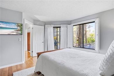 Tucked beneath a canopy of majestic live oaks in  Sea Palms West on Sea Palms Golf and Tennis Resort in Georgia - for sale on GolfHomes.com, golf home, golf lot