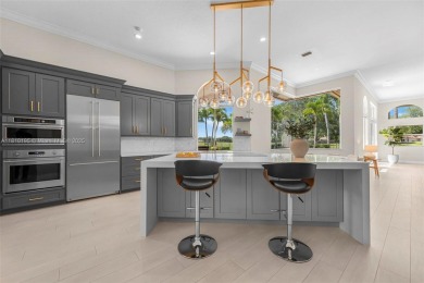 Luxury living awaits in this stunning one-story pool home on the on Weston Hills Country Club in Florida - for sale on GolfHomes.com, golf home, golf lot
