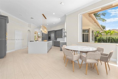 Luxury living awaits in this stunning one-story pool home on the on Weston Hills Country Club in Florida - for sale on GolfHomes.com, golf home, golf lot