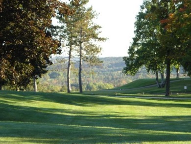 SKI SLOPE FRONT & GOLF FRONT END UNIT CONDO in the heart of the on The Otsego Club/The Tribute in Michigan - for sale on GolfHomes.com, golf home, golf lot