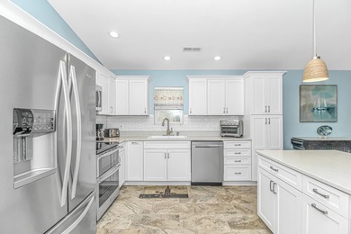 Welcome to 9846 Simonton Court, a stunning coastal retreat on International Club of Myrtle Beach in South Carolina - for sale on GolfHomes.com, golf home, golf lot