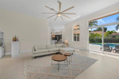 Luxury living awaits in this stunning one-story pool home on the on Weston Hills Country Club in Florida - for sale on GolfHomes.com, golf home, golf lot