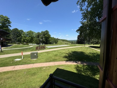 SKI SLOPE FRONT & GOLF FRONT END UNIT CONDO in the heart of the on The Otsego Club/The Tribute in Michigan - for sale on GolfHomes.com, golf home, golf lot