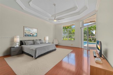 Luxury living awaits in this stunning one-story pool home on the on Weston Hills Country Club in Florida - for sale on GolfHomes.com, golf home, golf lot