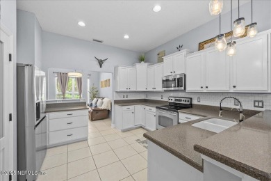 Beautifully maintained 3BR/2BA + versatile flex room in King and on King and Bear Golf Course/World Golf Village in Florida - for sale on GolfHomes.com, golf home, golf lot