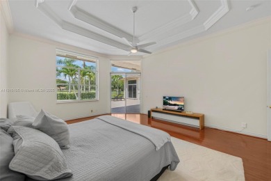 Luxury living awaits in this stunning one-story pool home on the on Weston Hills Country Club in Florida - for sale on GolfHomes.com, golf home, golf lot
