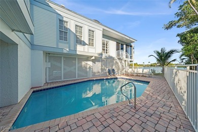 Stunning Lakefront Home Perfect for Nature Lovers Welcome to on The Dunes Golf and Tennis Club in Florida - for sale on GolfHomes.com, golf home, golf lot