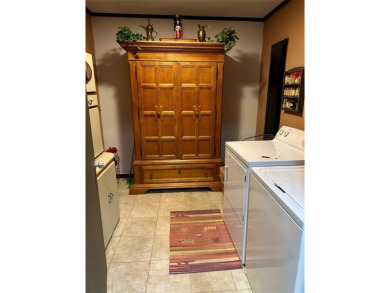 This beautiful home located in the prestigious Hideaway Lake on Hide-A-Way Lake Golf Course in Texas - for sale on GolfHomes.com, golf home, golf lot
