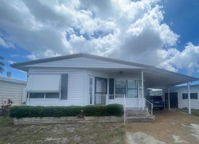 4530 9th St. #48 Bradenton, FL 34203  Twin Oaks 55+ Mobile Home on Heather Hills Golf Course in Florida - for sale on GolfHomes.com, golf home, golf lot