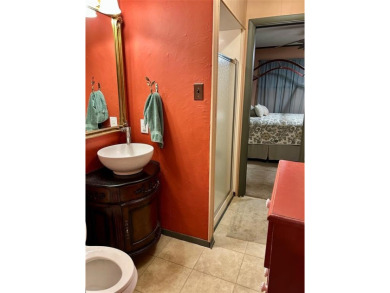 This beautiful home located in the prestigious Hideaway Lake on Hide-A-Way Lake Golf Course in Texas - for sale on GolfHomes.com, golf home, golf lot