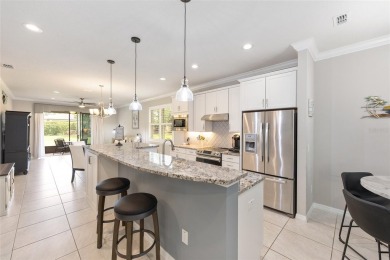 Experience the ease of carefree living in this stunningly on Stone Creek Golf Club in Florida - for sale on GolfHomes.com, golf home, golf lot