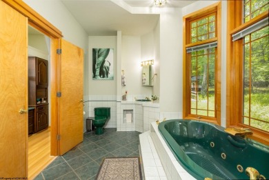 Welcome to 'Soothing Waters,' a custom-built luxury home by Don on Alpine Lake Resort in West Virginia - for sale on GolfHomes.com, golf home, golf lot