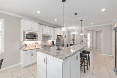 Experience the ease of carefree living in this stunningly on Stone Creek Golf Club in Florida - for sale on GolfHomes.com, golf home, golf lot