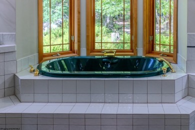 Welcome to 'Soothing Waters,' a custom-built luxury home by Don on Alpine Lake Resort in West Virginia - for sale on GolfHomes.com, golf home, golf lot
