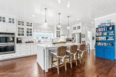 Imagine living in this stunning 2016 custom-built pool home on Magnolia Point Golf and Country Club in Florida - for sale on GolfHomes.com, golf home, golf lot