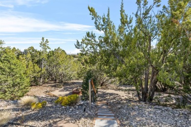 Discover your dream home on nearly an acre of fenced land with on Pueblo de Cochiti Golf Course in New Mexico - for sale on GolfHomes.com, golf home, golf lot