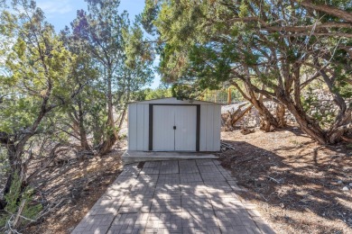 Discover your dream home on nearly an acre of fenced land with on Pueblo de Cochiti Golf Course in New Mexico - for sale on GolfHomes.com, golf home, golf lot