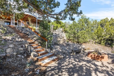 Discover your dream home on nearly an acre of fenced land with on Pueblo de Cochiti Golf Course in New Mexico - for sale on GolfHomes.com, golf home, golf lot