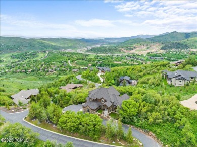 Nestled in the trees on just over an acre of land, this 4 on Jeremy Golf and Country Club in Utah - for sale on GolfHomes.com, golf home, golf lot
