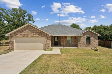 This charming 3 bedroom 2 bath home is nestled in the Holiday on Holiday Hills Country Club in Texas - for sale on GolfHomes.com, golf home, golf lot