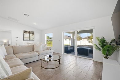 Charming 2024 Cape Coral Gem - No Flood Insurance Required! on Burnt Store Golf Club in Florida - for sale on GolfHomes.com, golf home, golf lot