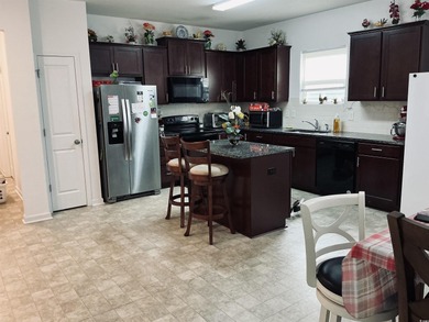 This model is a single story Compton floor plan offers the on Myrtle Beach National Golf Course in South Carolina - for sale on GolfHomes.com, golf home, golf lot