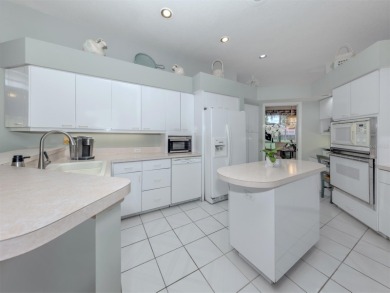 Positioned along the third fairway of The Venice Golf & Country on The Venice Golf and Country Club in Florida - for sale on GolfHomes.com, golf home, golf lot