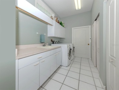 Positioned along the third fairway of The Venice Golf & Country on The Venice Golf and Country Club in Florida - for sale on GolfHomes.com, golf home, golf lot