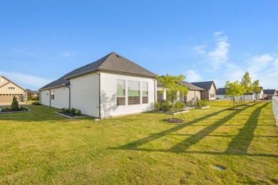 This stunning custom-built home, completed in 2025, showcases on Wildhorse Golf Club of Robson Ranch in Texas - for sale on GolfHomes.com, golf home, golf lot