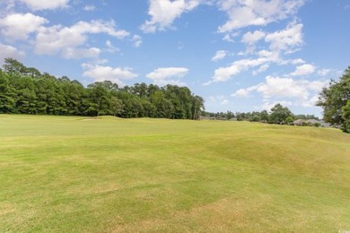 Welcome home to your all brick rancher nestled in the quaint on Long Bay Club in South Carolina - for sale on GolfHomes.com, golf home, golf lot