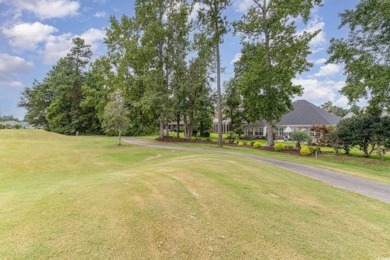 Welcome home to your all brick rancher nestled in the quaint on Long Bay Club in South Carolina - for sale on GolfHomes.com, golf home, golf lot