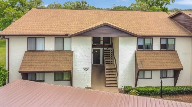 This charming 2 bed / 2 full bath condo is nestled in a quiet on Country Club At Silver Springs Shores in Florida - for sale on GolfHomes.com, golf home, golf lot
