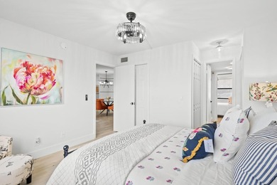 FULLY RENOVATED first-floor 2 bedroom/1.5 baths with screened on Sunrise Lakes Phase III in Florida - for sale on GolfHomes.com, golf home, golf lot