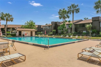 This charming 2 bed / 2 full bath condo is nestled in a quiet on Country Club At Silver Springs Shores in Florida - for sale on GolfHomes.com, golf home, golf lot
