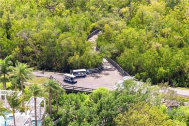 Nestled within one of Naples' most sought after communities on Club at Pelican Bay Golf Course in Florida - for sale on GolfHomes.com, golf home, golf lot