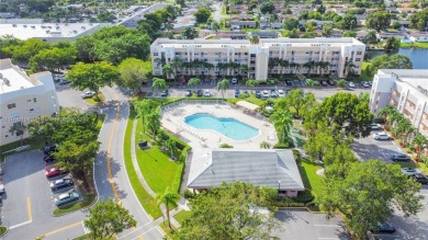 Imagine starting each day in a meticulously designed 3-bedroom on Sunrise Lakes Phase IV Golf Course in Florida - for sale on GolfHomes.com, golf home, golf lot