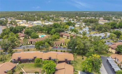 This charming 2 bed / 2 full bath condo is nestled in a quiet on Country Club At Silver Springs Shores in Florida - for sale on GolfHomes.com, golf home, golf lot