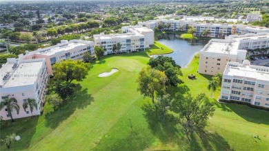 Imagine starting each day in a meticulously designed 3-bedroom on Sunrise Lakes Phase IV Golf Course in Florida - for sale on GolfHomes.com, golf home, golf lot