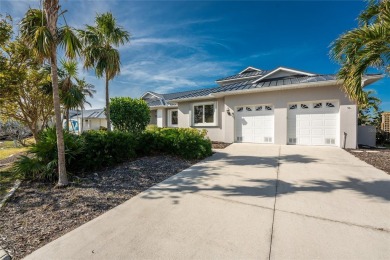 Stunning WATERFRONT home is located on an oversized lot in a on Saint Andrews South Golf Club in Florida - for sale on GolfHomes.com, golf home, golf lot