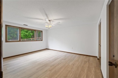 Welcome to this stunning 4-bedroom, 3-bathroom home situated on on Braemar Golf Course in Minnesota - for sale on GolfHomes.com, golf home, golf lot