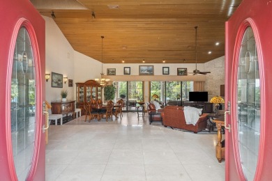 Step into country club living at its finest in this expansive on Pipers Landing Country Club in Florida - for sale on GolfHomes.com, golf home, golf lot