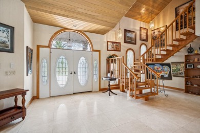 Step into country club living at its finest in this expansive on Pipers Landing Country Club in Florida - for sale on GolfHomes.com, golf home, golf lot