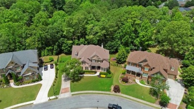 Welcome to this luxurious 5-bedroom, 4-bathroom estate nestled on Hamilton Mill Golf Club in Georgia - for sale on GolfHomes.com, golf home, golf lot