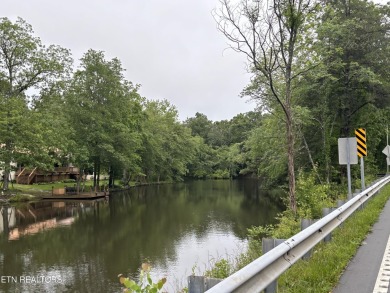 Over one acre soil tested and surveyed water front property in on Lake Tansi Village Country Club in Tennessee - for sale on GolfHomes.com, golf home, golf lot