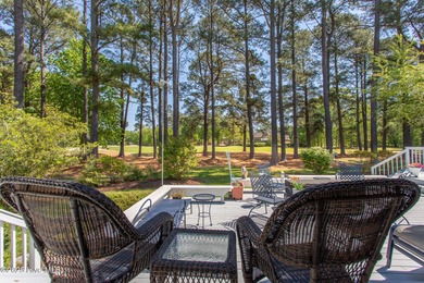 This incredible golf course offers lovely views of the course on Sound Golf Links at Albemarle Plantation in North Carolina - for sale on GolfHomes.com, golf home, golf lot