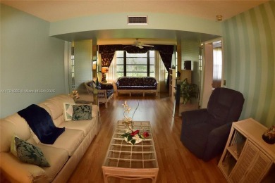 Price Improvement on this spacious top floor 2 bedroom condo in on The Country Club At Boca Raton in Florida - for sale on GolfHomes.com, golf home, golf lot