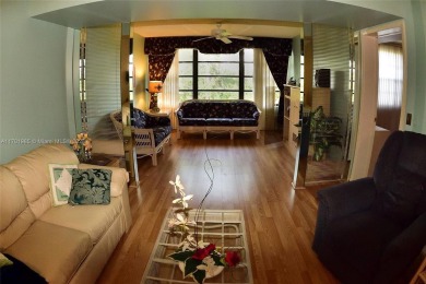 Price Improvement on this spacious top floor 2 bedroom condo in on The Country Club At Boca Raton in Florida - for sale on GolfHomes.com, golf home, golf lot