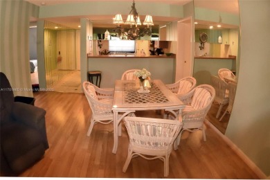 Price Improvement on this spacious top floor 2 bedroom condo in on The Country Club At Boca Raton in Florida - for sale on GolfHomes.com, golf home, golf lot