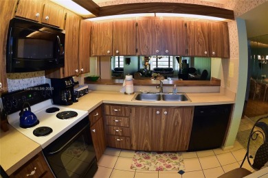 Price Improvement on this spacious top floor 2 bedroom condo in on The Country Club At Boca Raton in Florida - for sale on GolfHomes.com, golf home, golf lot