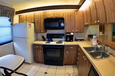 Price Improvement on this spacious top floor 2 bedroom condo in on The Country Club At Boca Raton in Florida - for sale on GolfHomes.com, golf home, golf lot